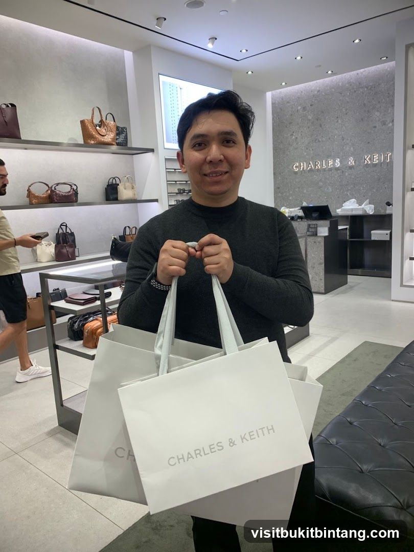 Man holding shopping bags in a store