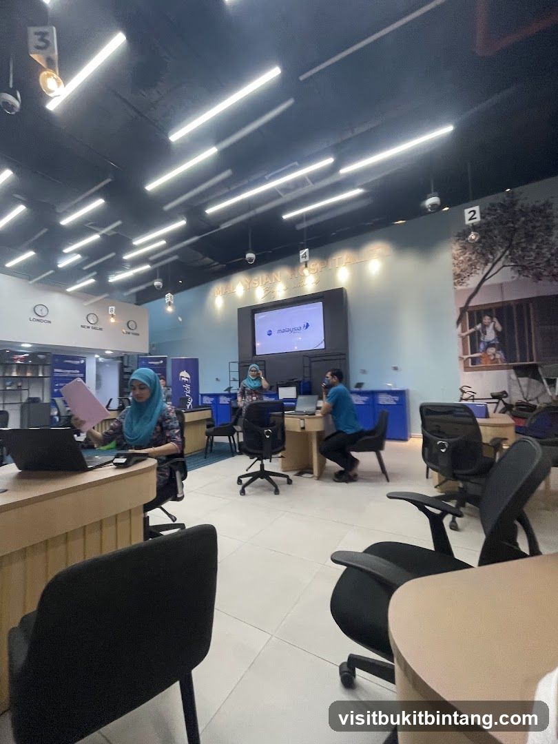Office interior with staff and signage
