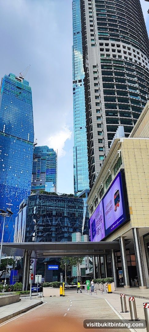 Modern Cityscape with Tall Buildings and Digital Billboard