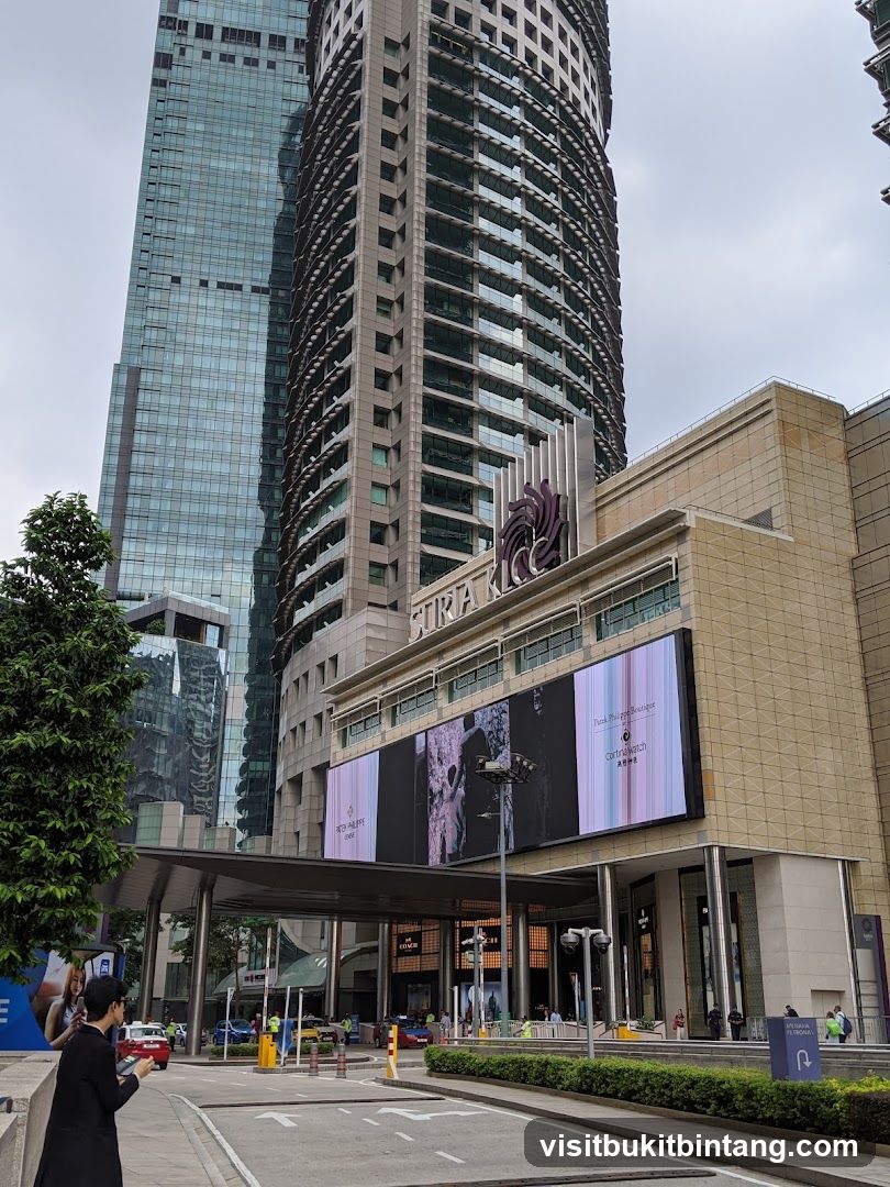 Modern Cityscape with Tall Buildings and Digital Billboards