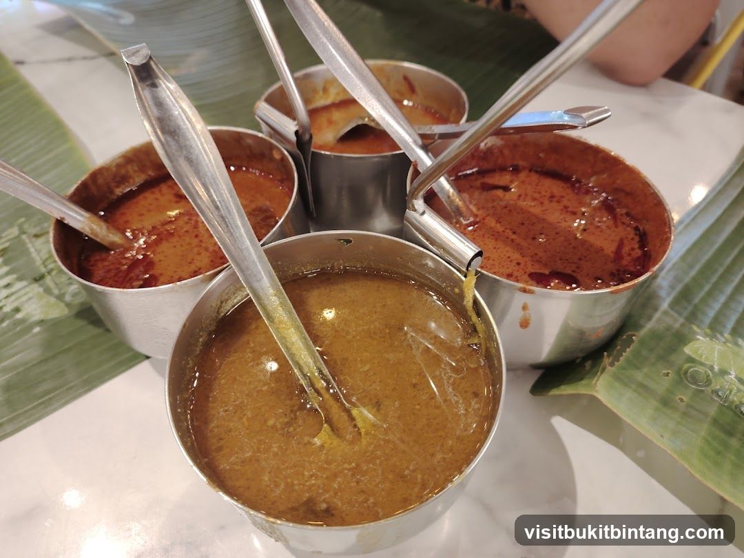 Four bowls of curry