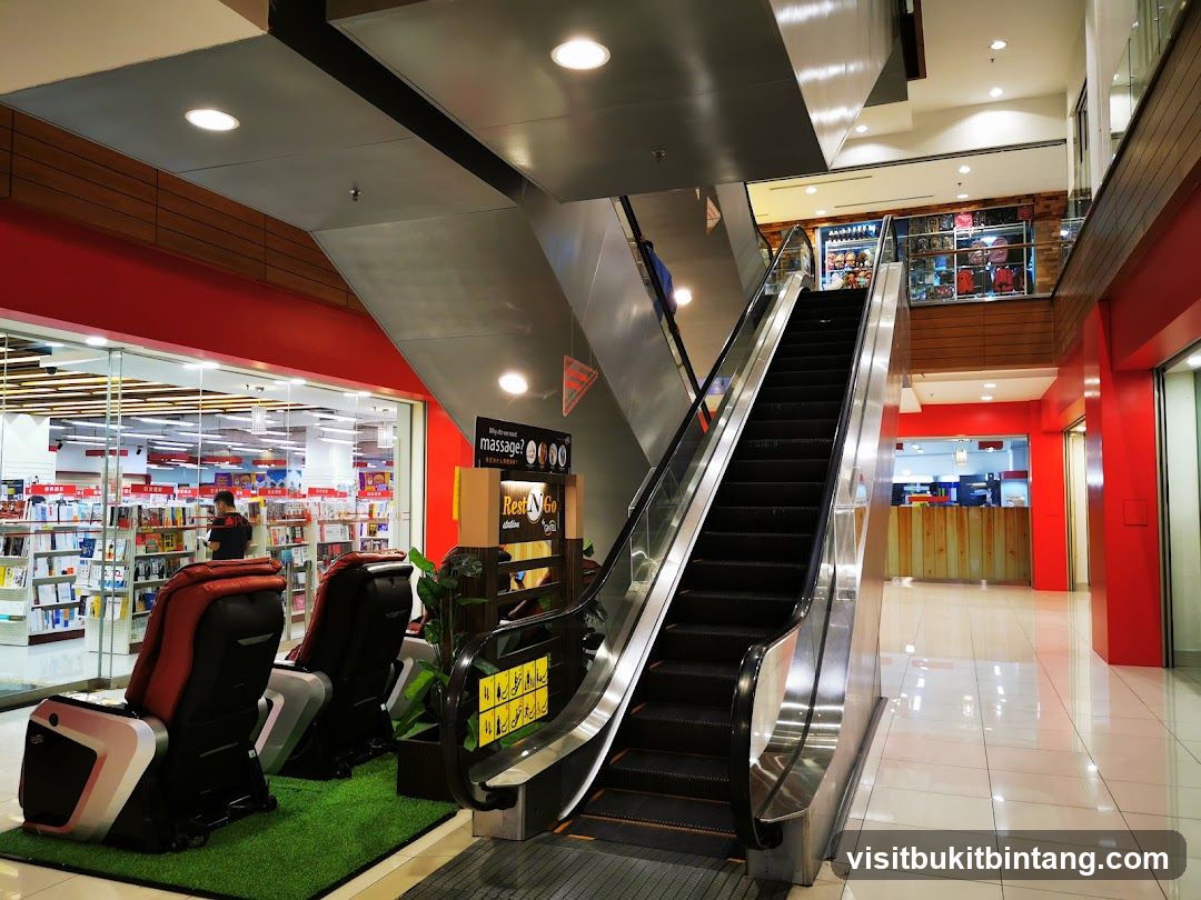 Mall Interior with Escalator and Massage Chairs