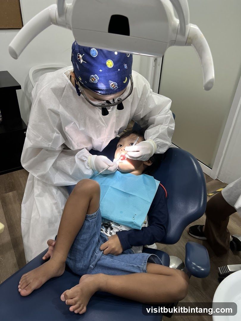 Dentist examining a child's teeth