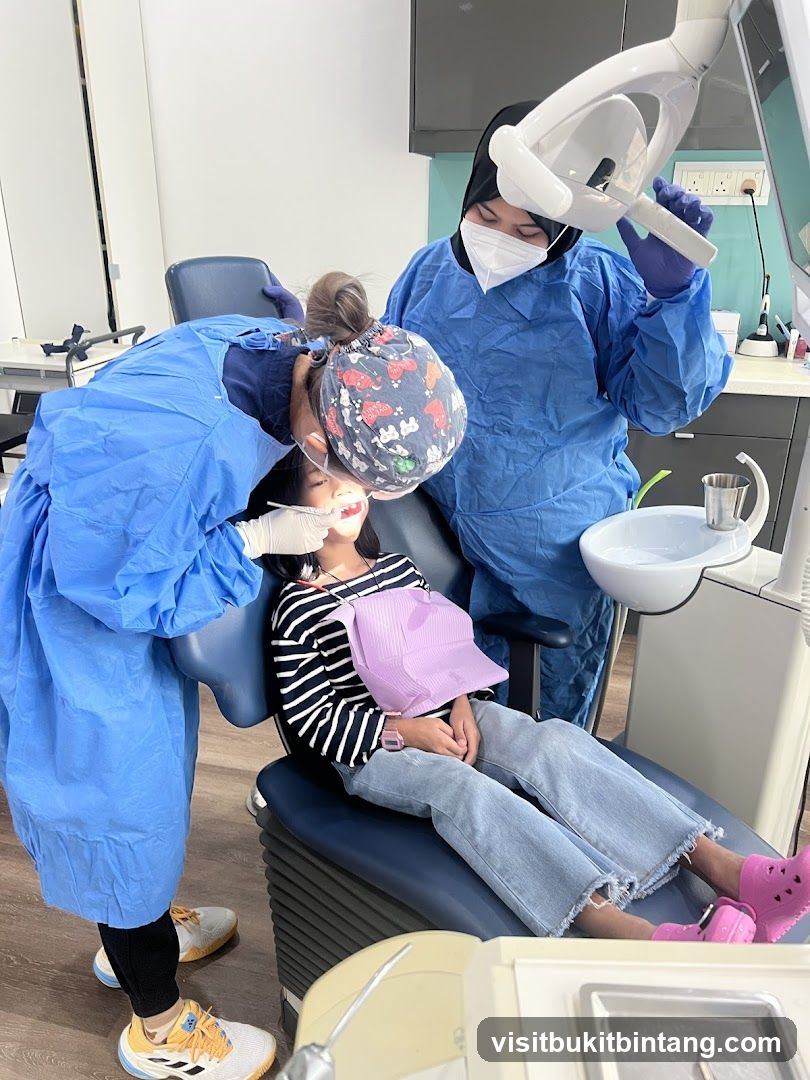 Dentist examining a child's teeth