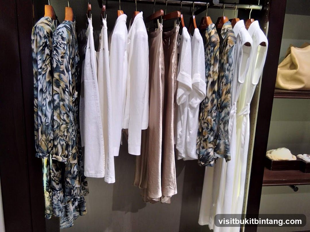 Clothing Rack with Dresses and Shirts