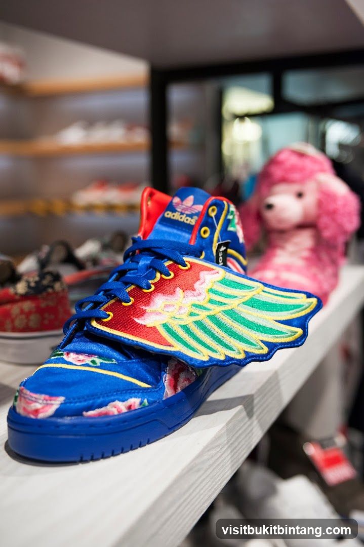 Adidas High-Top Sneakers with Wing Detail