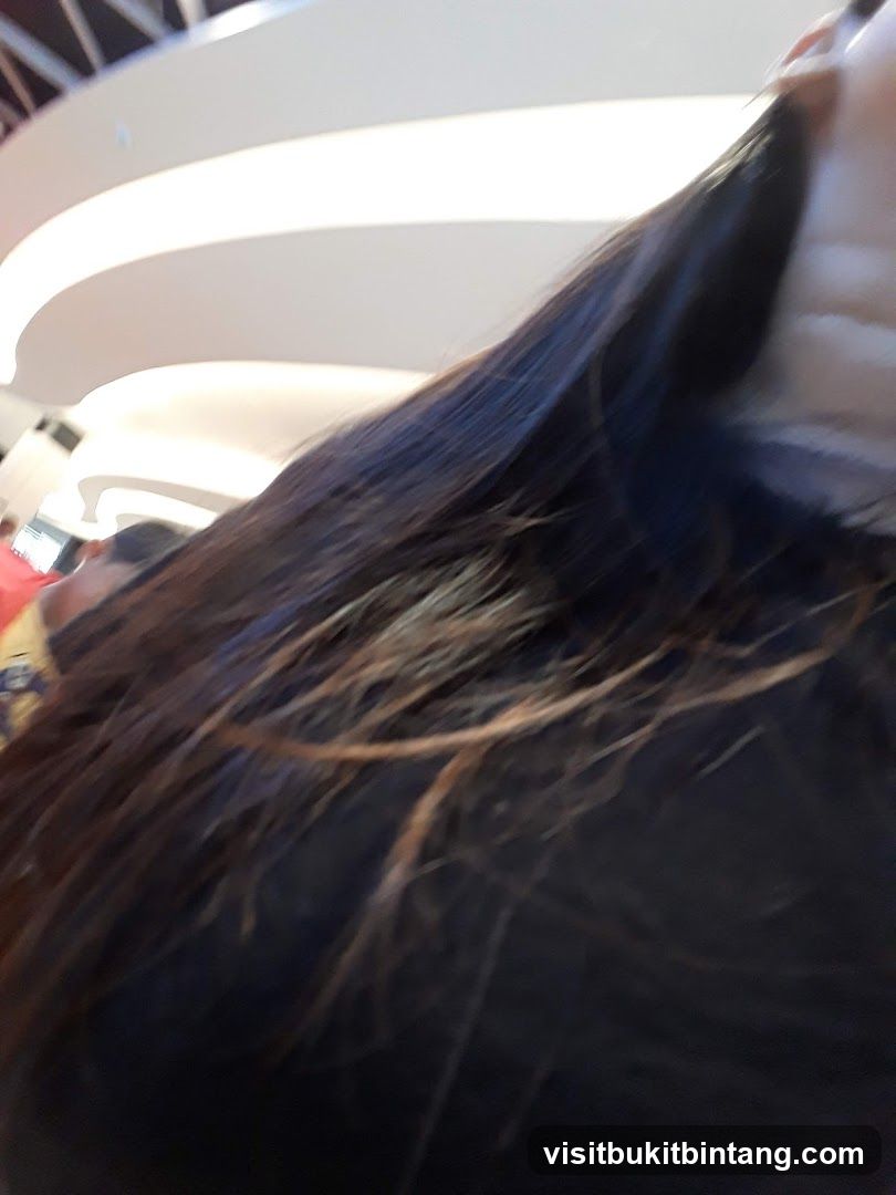 Woman's Hair and Ceiling Lights