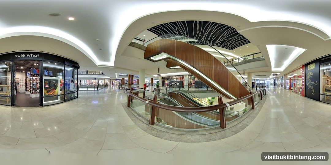Mall Interior with Escalators and Shops