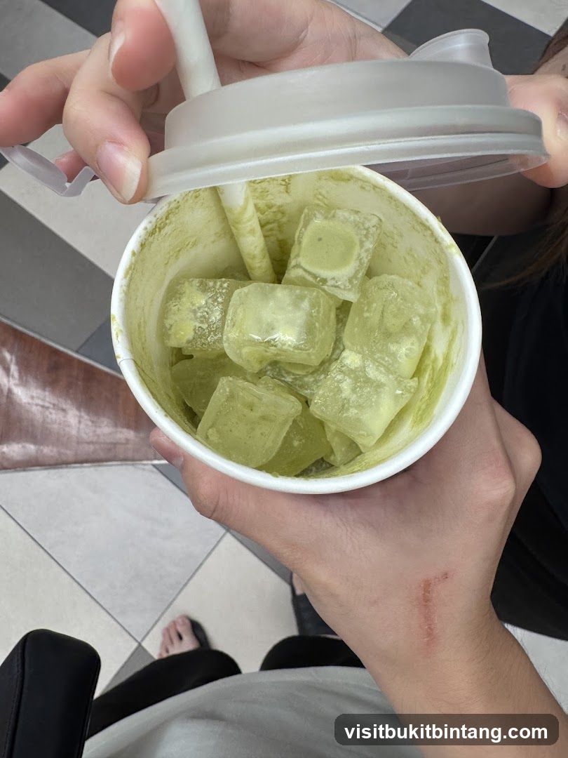Matcha drink with ice cubes