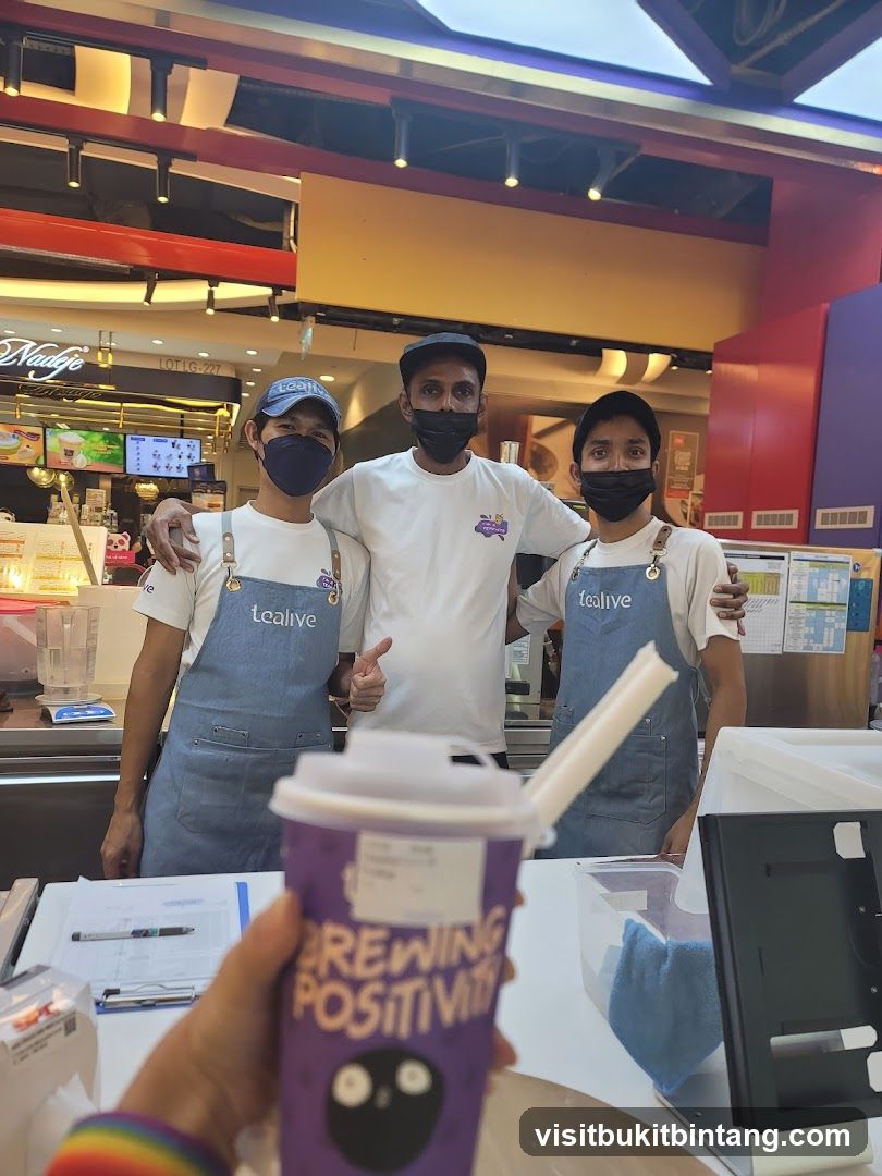 Tealive Staff Posing with Drink