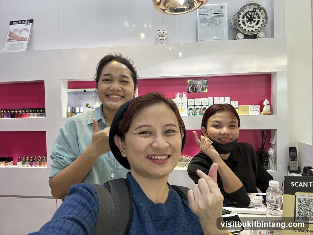 Three women smiling at the camera