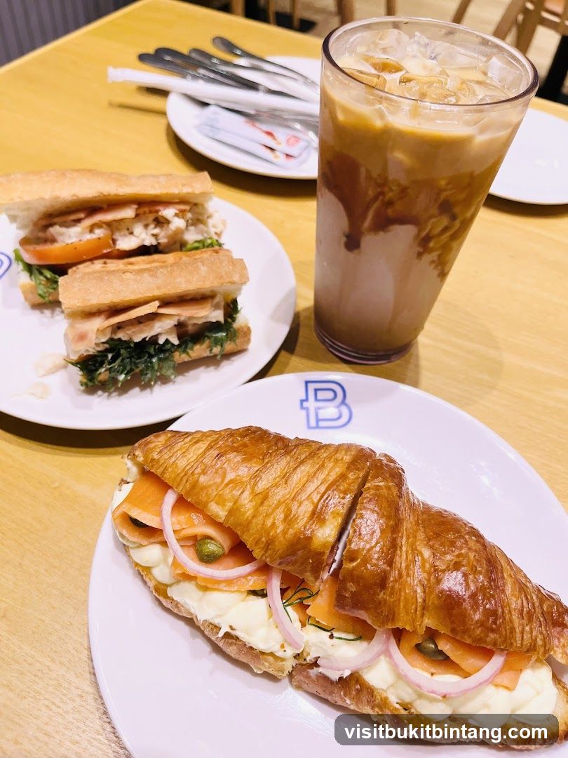 Croissant Sandwich and Iced Coffee