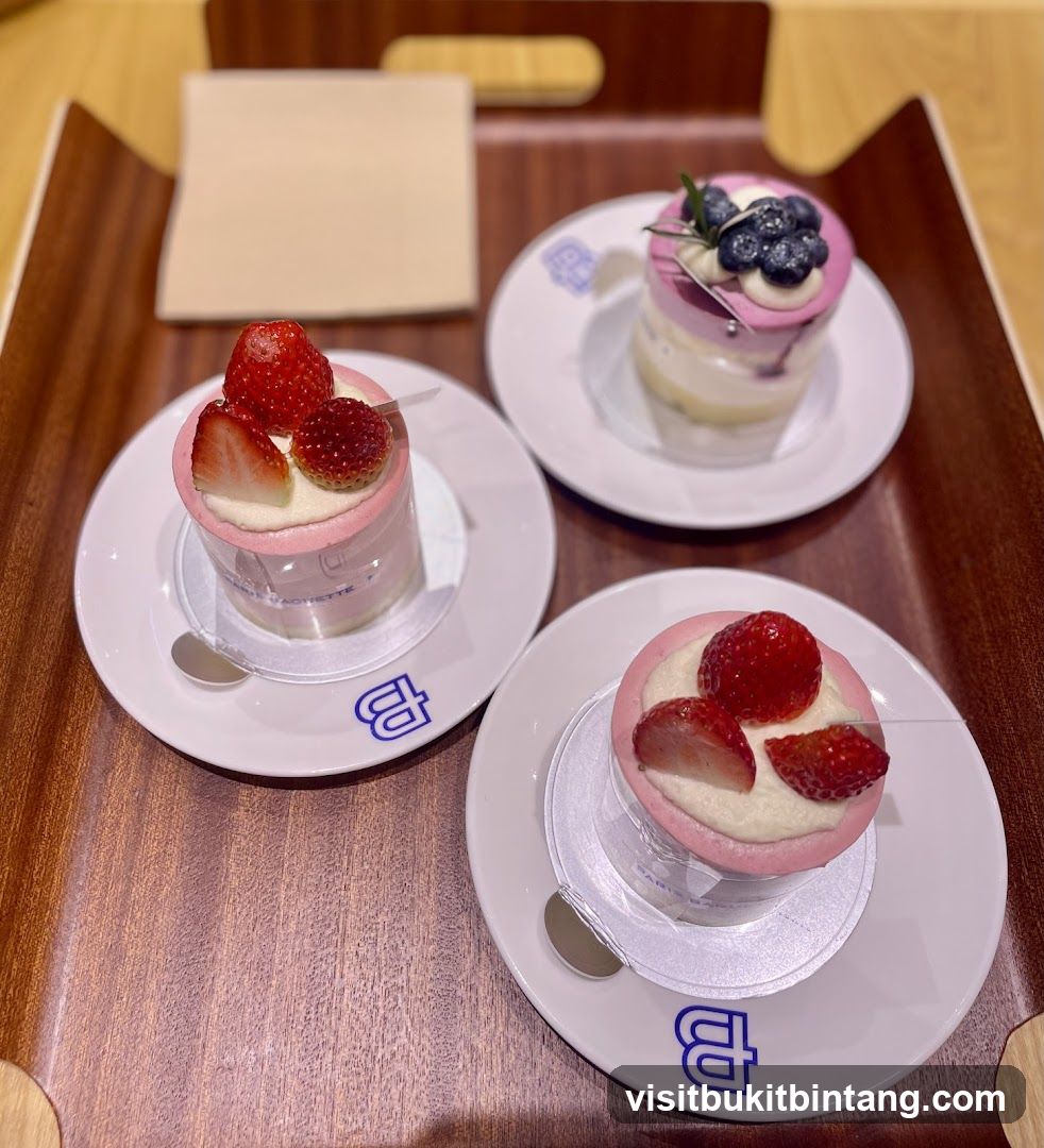 Three Small Cakes on a Tray