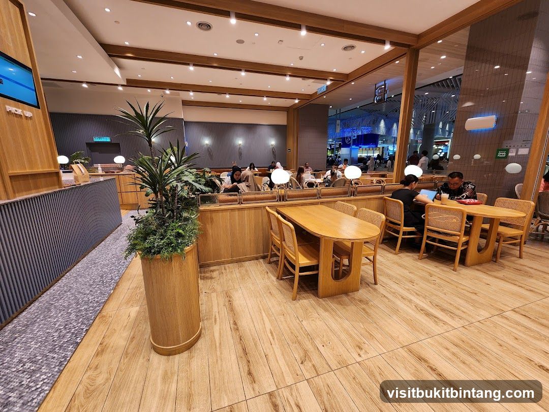 Interior of a cafe with wooden tables and chairs