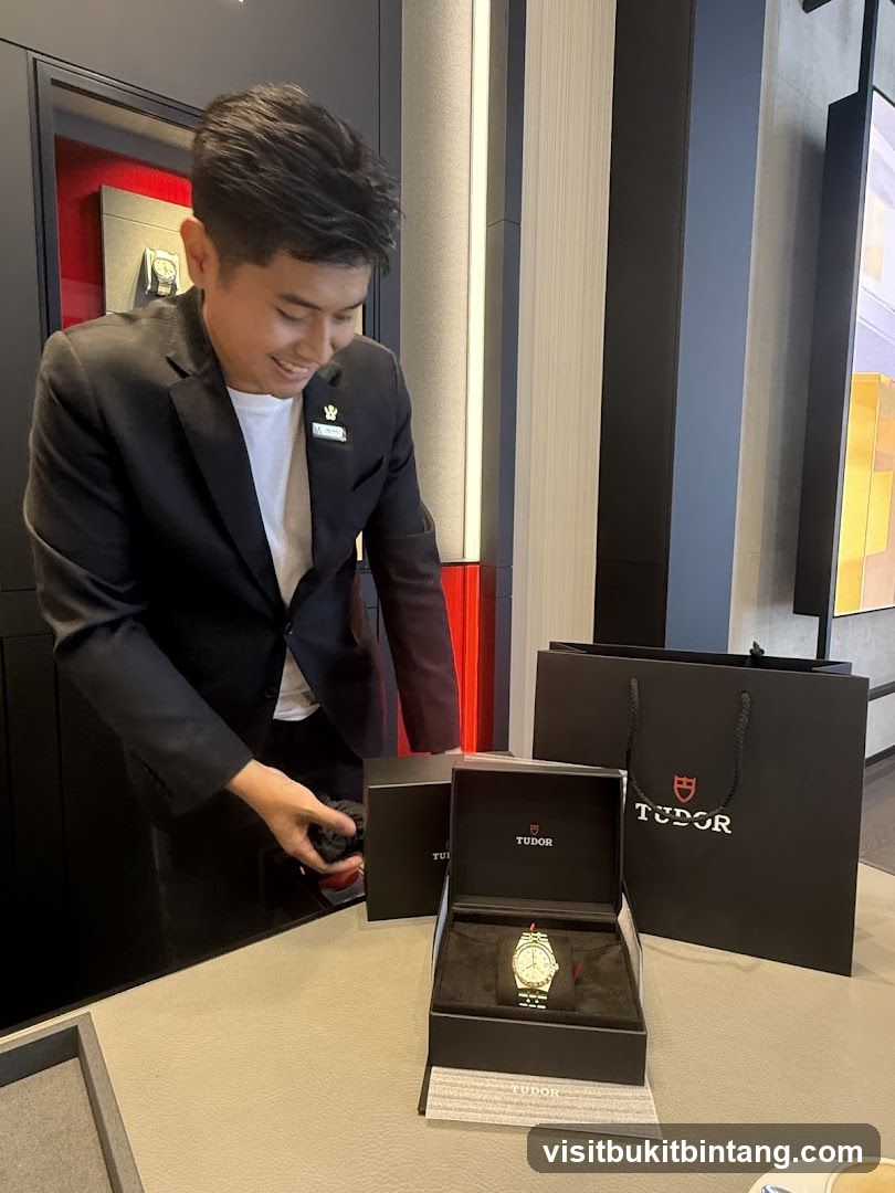 Salesperson presenting a Tudor watch