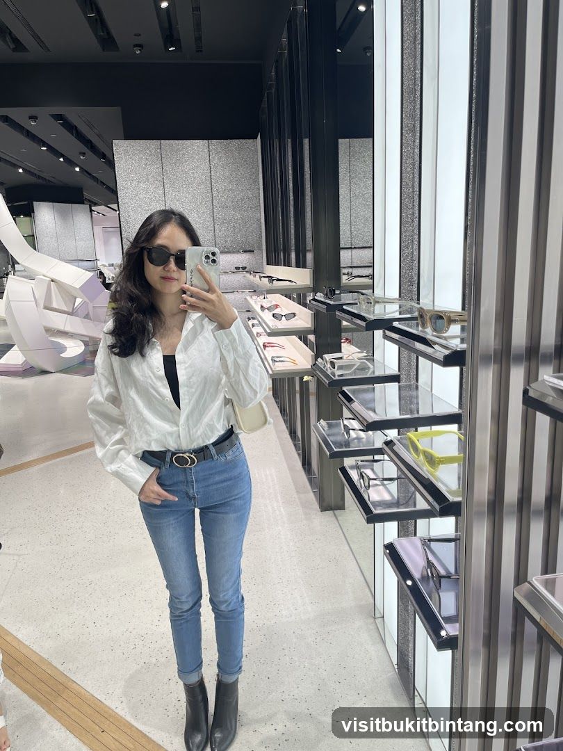 Woman taking a mirror selfie in a store