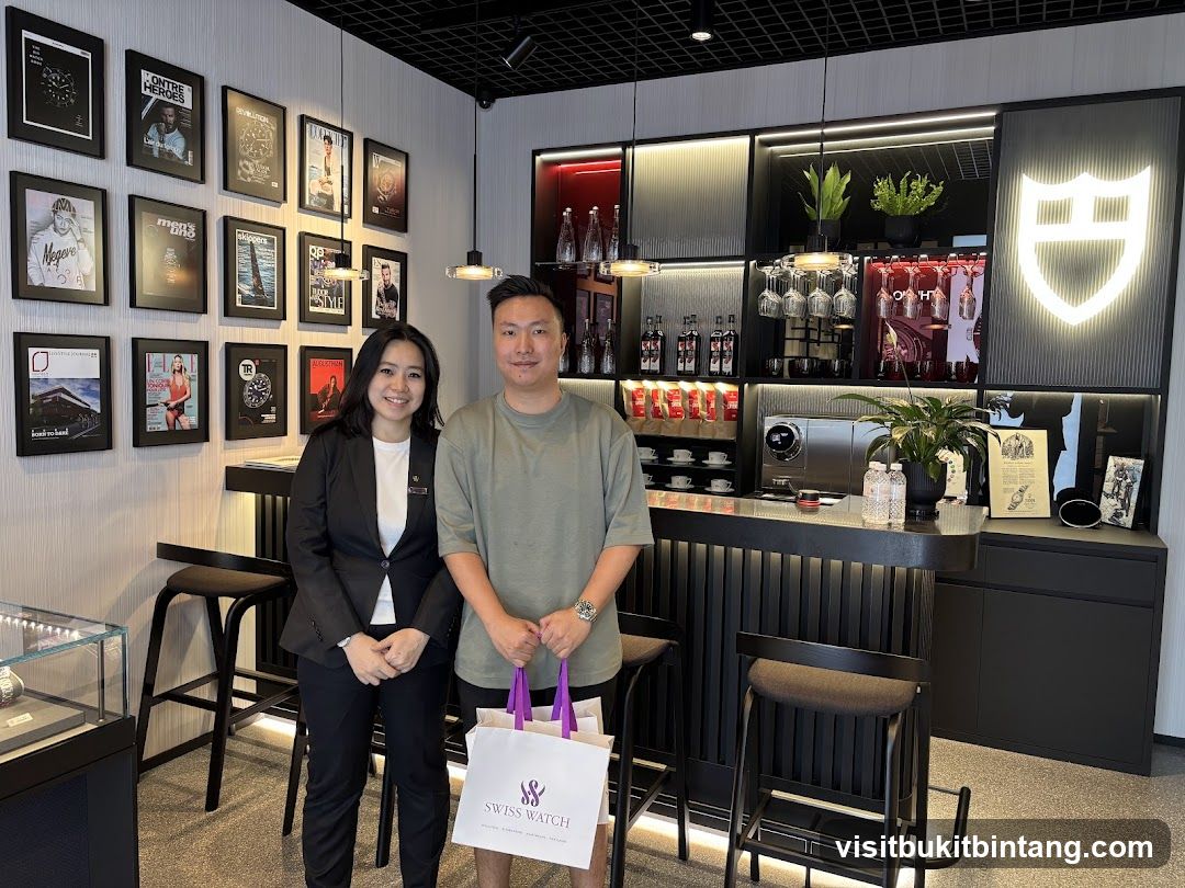 Two people in a watch store