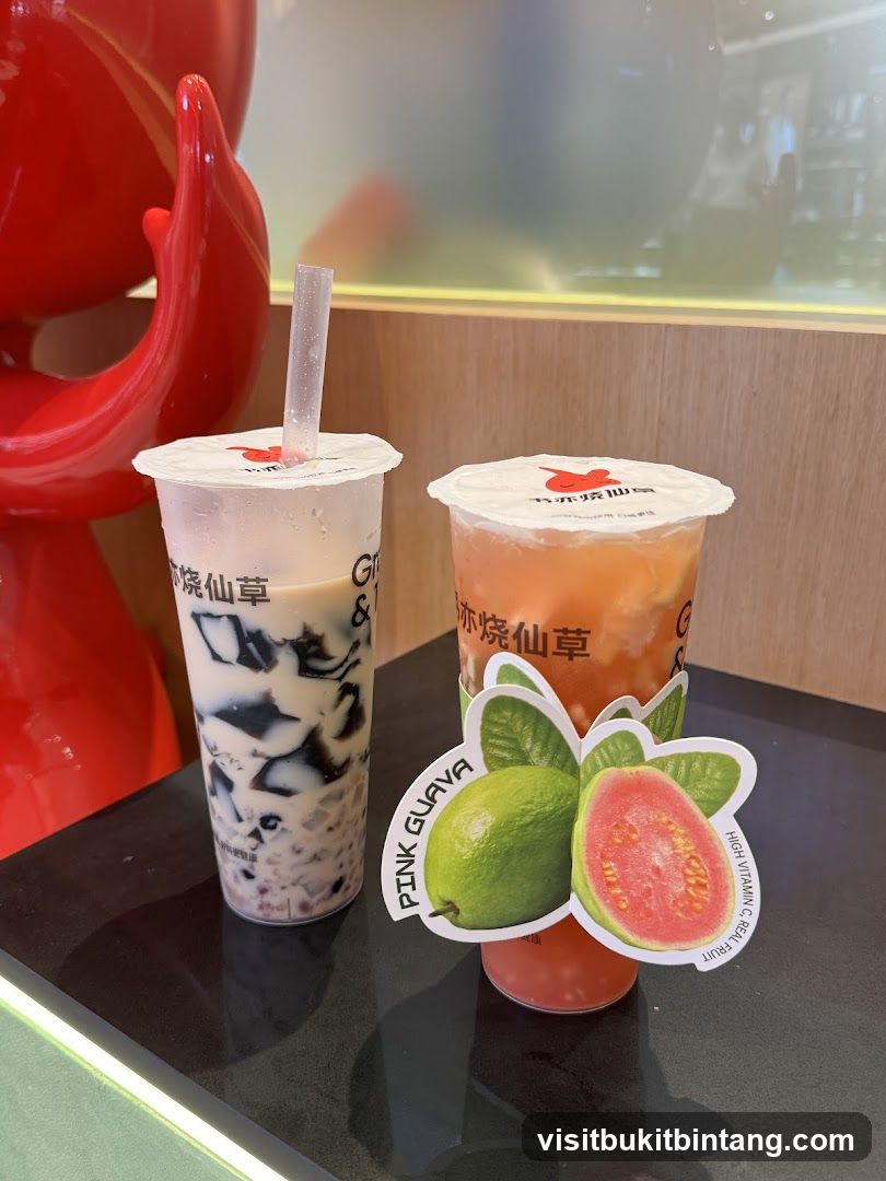 Two drinks with a guava decoration