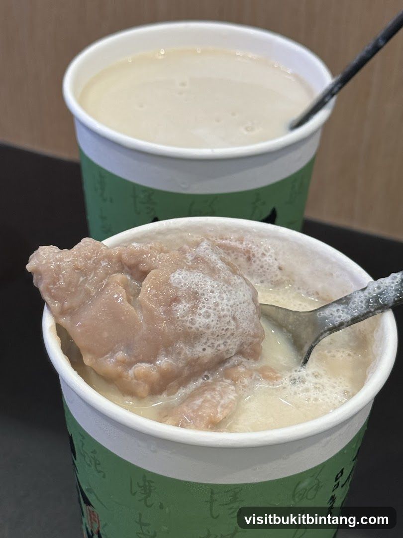 Two Cups of Drink with Toppings