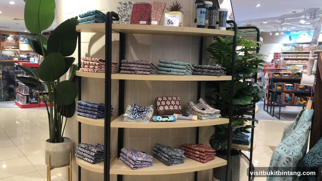 Store Display with Folded Textiles and Plants
