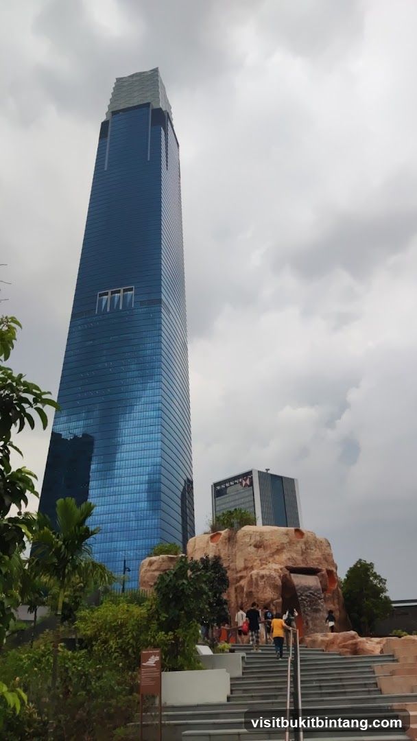 Modern Skyscraper and Artificial Waterfall