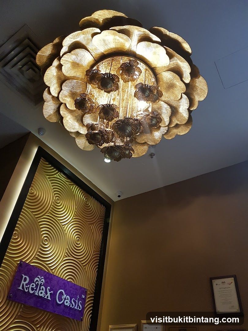 Interior of a spa with a decorative chandelier and signage