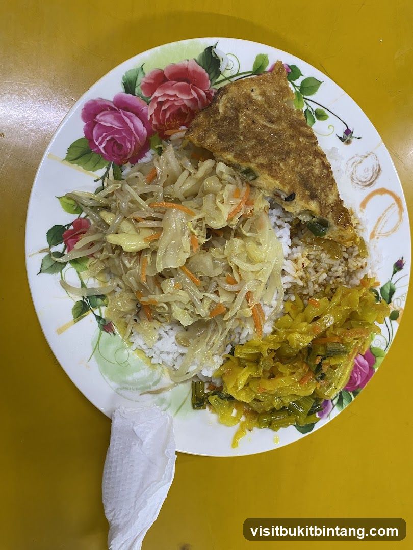 Rice plate with omelet and vegetables