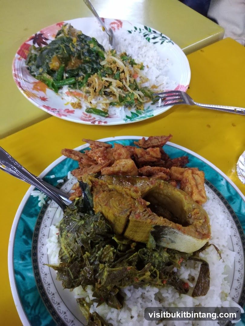 Two plates of rice with side dishes
