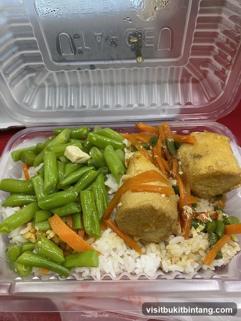 Takeout Meal with Rice, Green Beans, Carrots, and Tofu