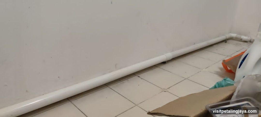 Bathroom Interior with Plumbing Pipe