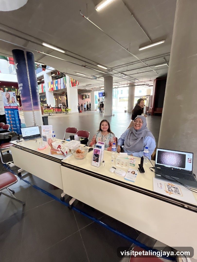 Indoor Event Setup with Staff at Desk