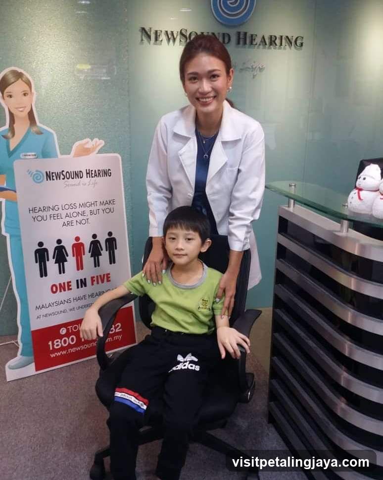 Hearing Clinic Interior with Staff and Patient