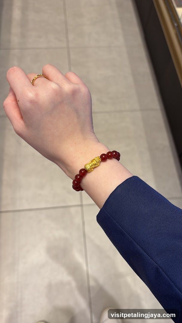 Red Beaded Bracelet with Gold Charm