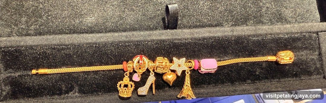 Gold Bracelet with Charms