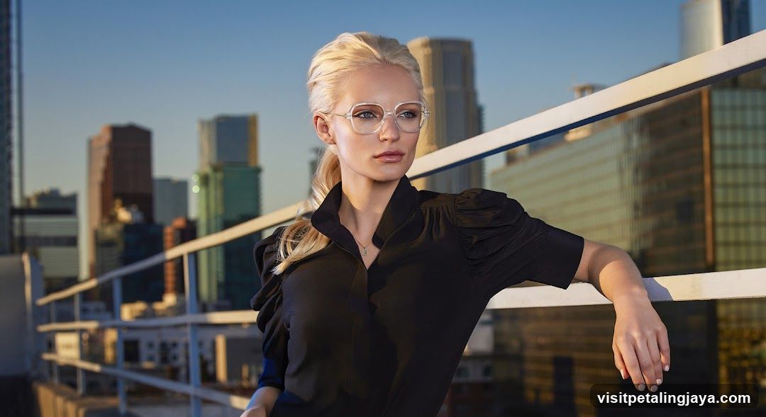 Blonde woman in black blouse on rooftop