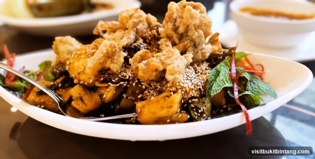 Crispy Fried Dish with Sauce and Sesame Seeds