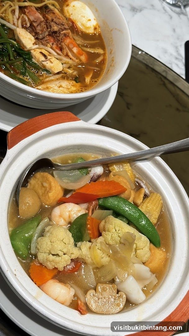 Two Bowls of Asian Noodle Soup and Stir-fry
