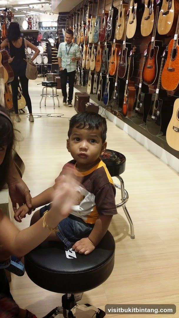 Child in a music store