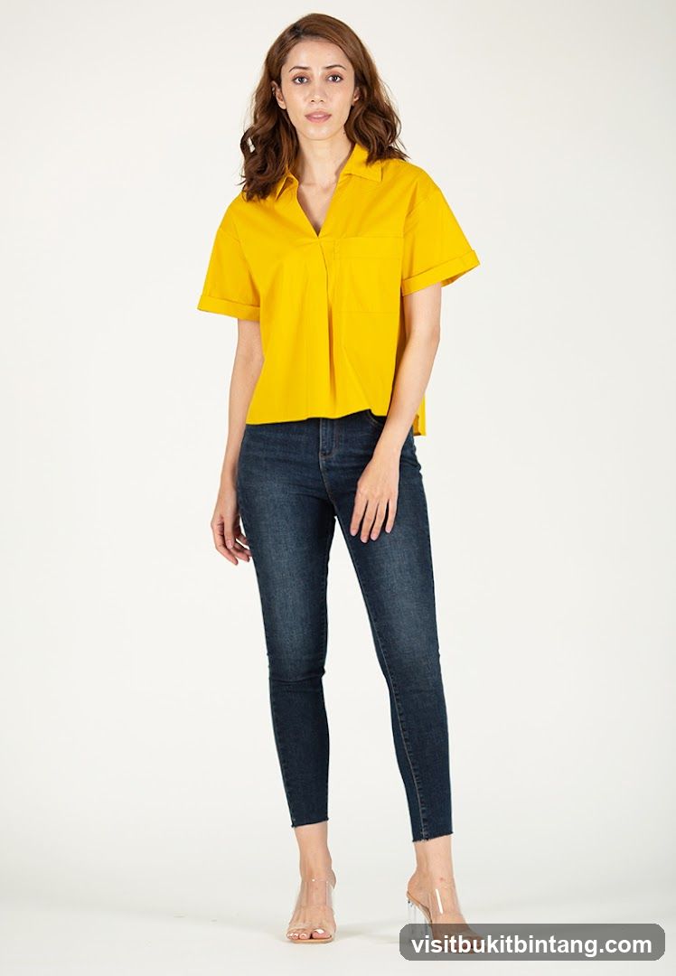 Woman in Yellow Top and Jeans