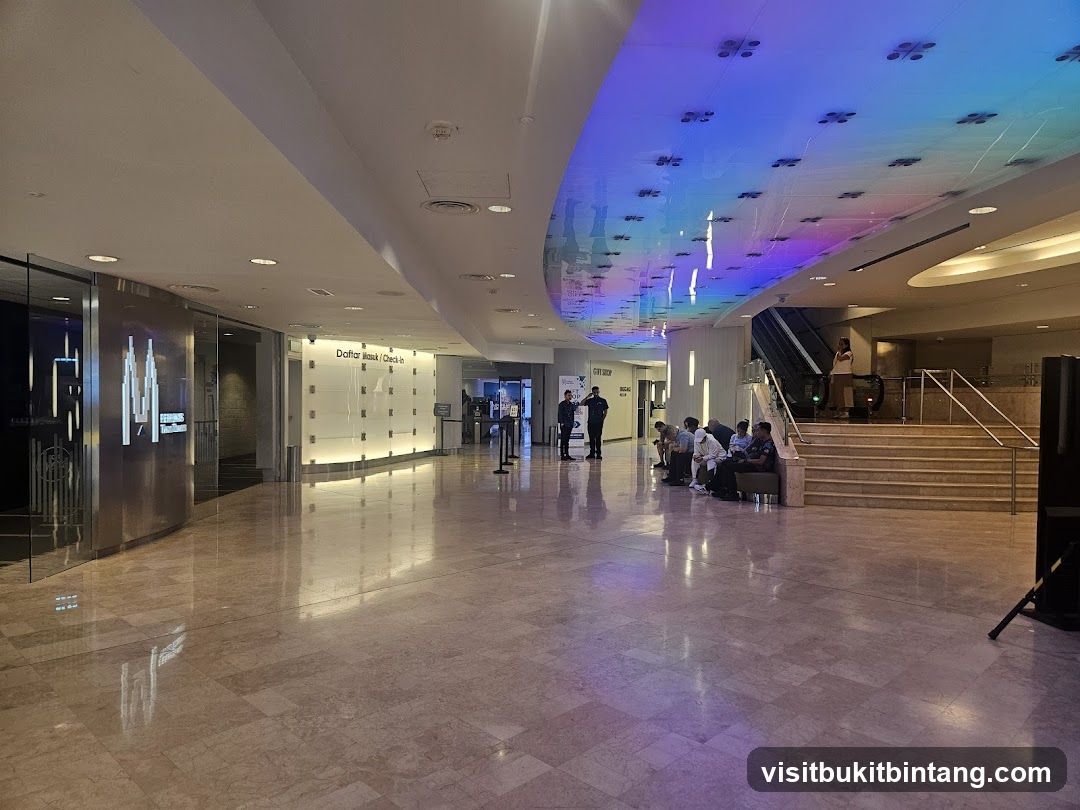 Modern Lobby with Colorful Ceiling and Seating Area