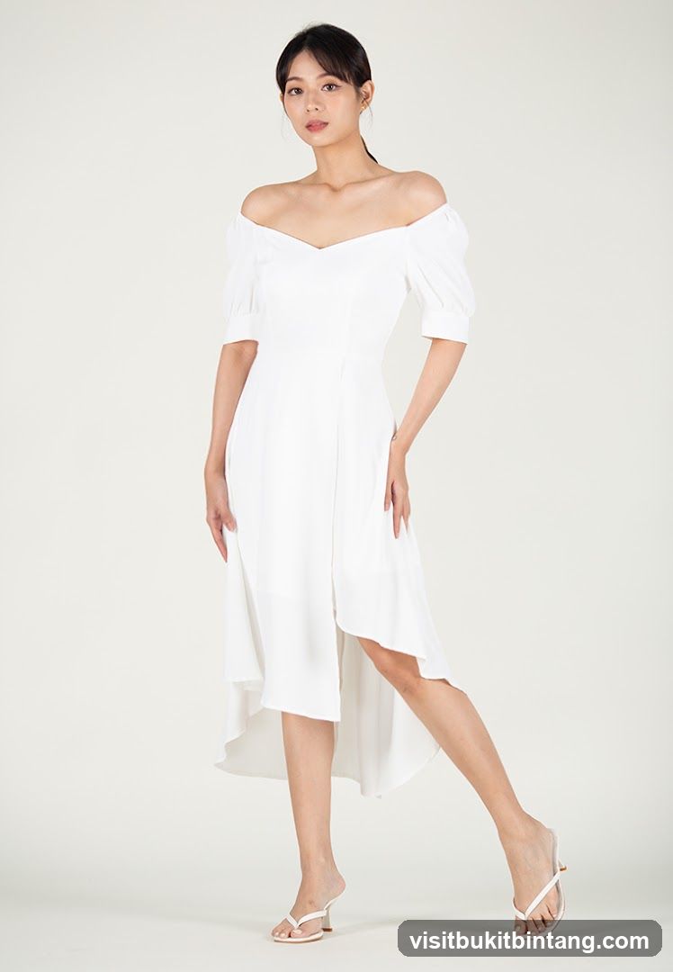 Woman in White Off-the-Shoulder Dress