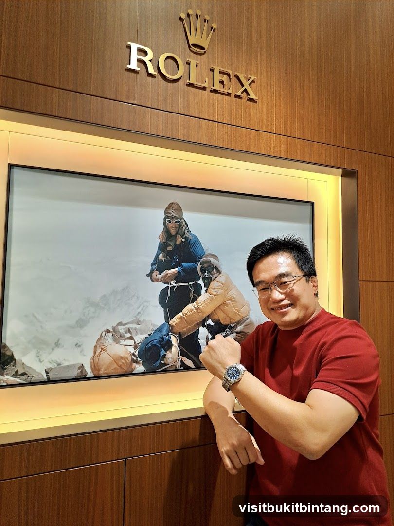 Man Posing with Rolex Watch in Front of Display