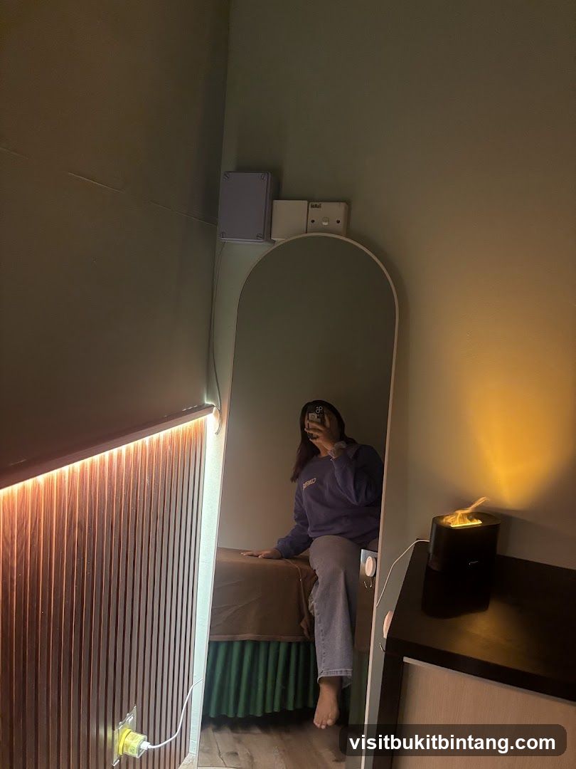Woman Sitting in Front of Mirror