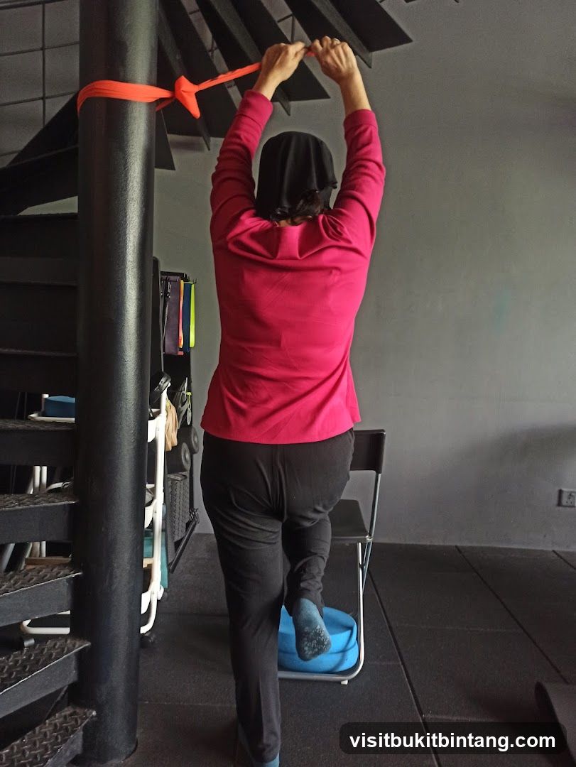Woman exercising with resistance band