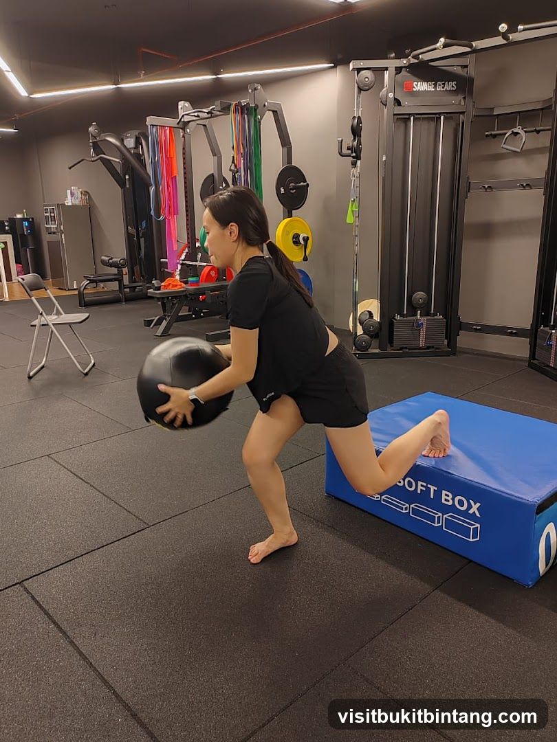 Woman exercising with a medicine ball
