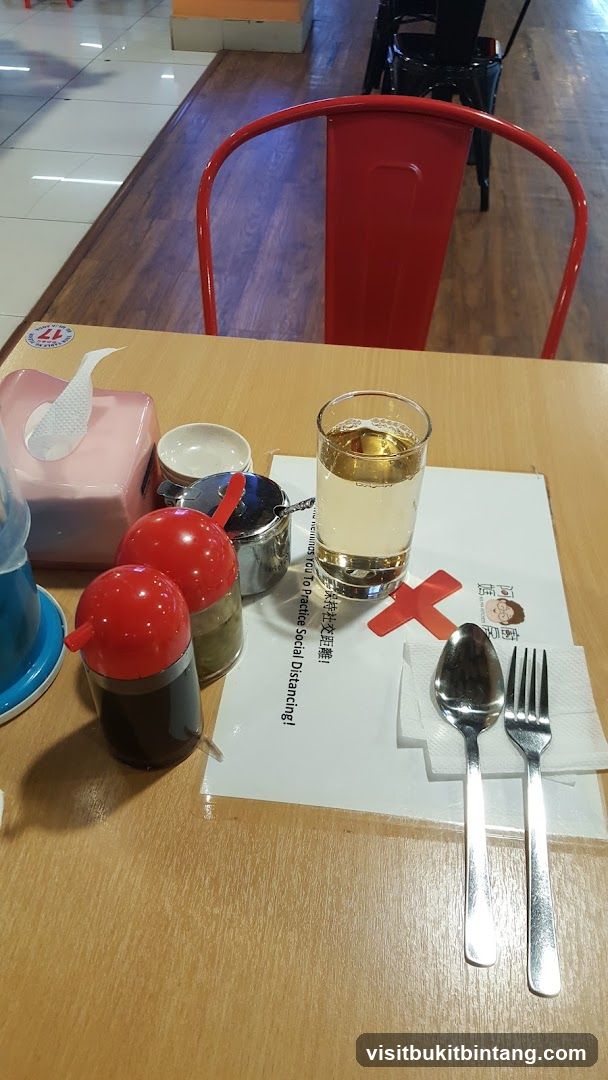 Table Setting with Condiments and Drink