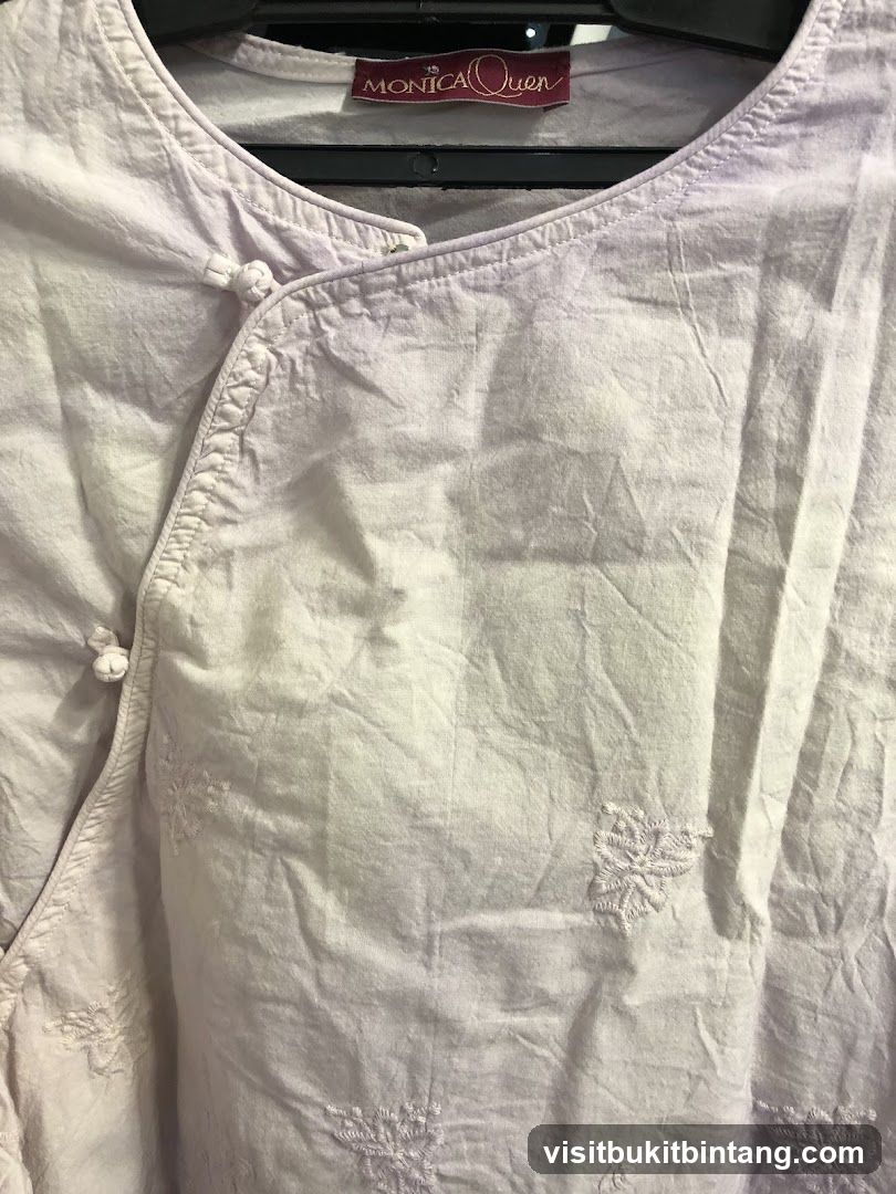 Monica Quen Clothing Tag