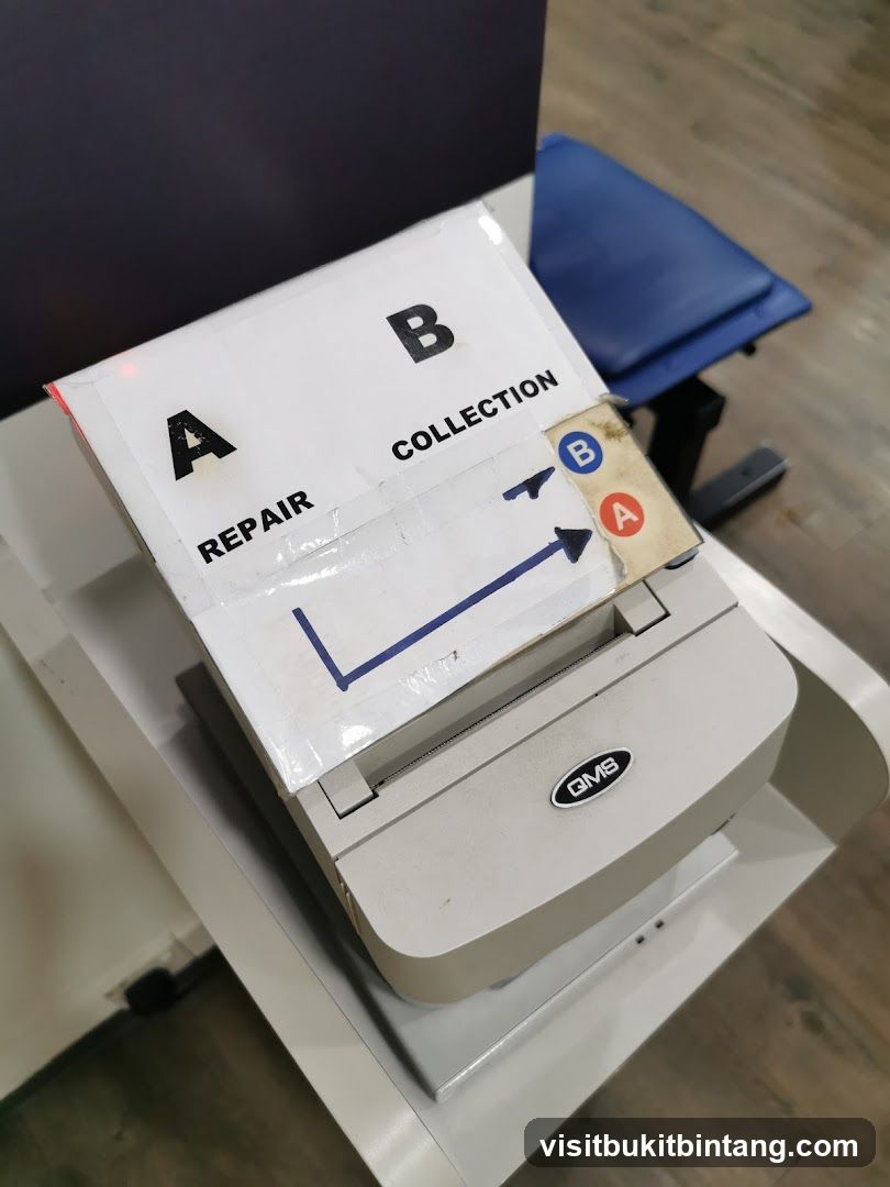 Labelled collection box on a printer