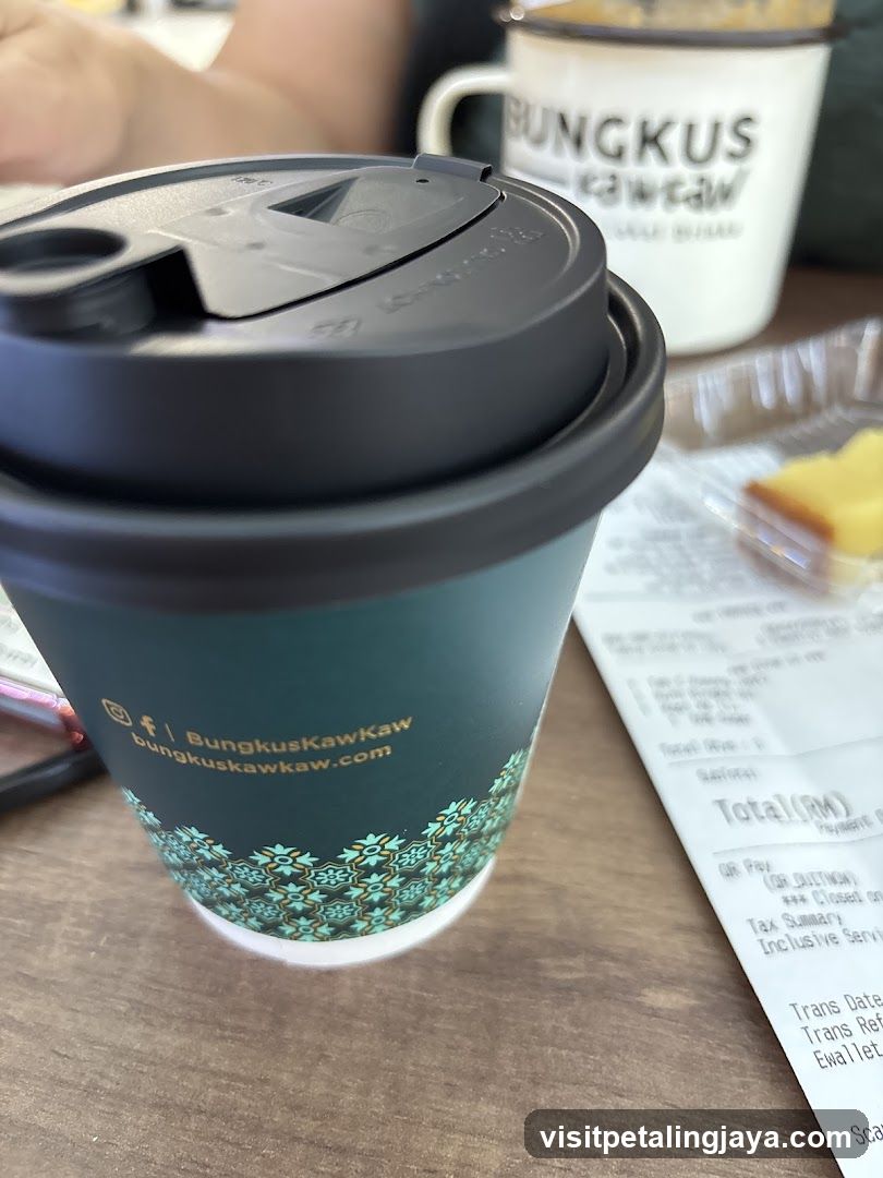 Bungkus Kawkaw Coffee Cup and Receipt