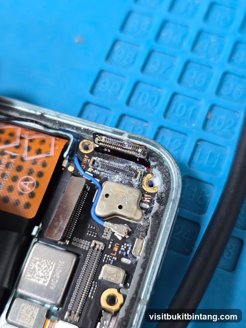 Close-up of a damaged electronic device circuit board